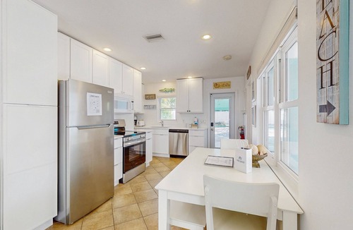Anna Maria Cabin | Colorful beach cottage w/heated private pool & grill area - dog-friendly