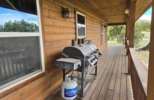 Alpine Village Cabin | Conveniently located cabin with full kitchen, w/d, large deck & great views