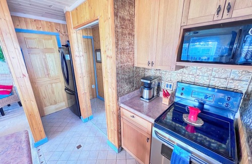 Conway Condo | Cozy 1 bd/1.5 Bath Condo in tranquil Crooked Lake with Kayaks & Dock