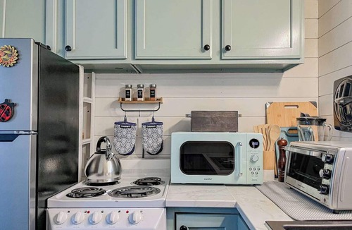 Littleton Cabin | Cozy camp cabin & RV with fire pit, outdoor dining, games, kayaks and more!