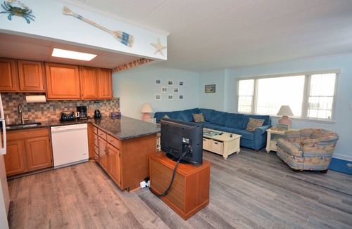 Midtown Ocean City Condo | Cozy, stylish 2 bedroom condo with free WiFi just a short stroll to the beach among the excitement of downtown only a few streets from the boardwalk!