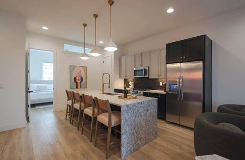 Katie Hill Neighborhood House | Cumberland Social Near Broadway | Rooftop Hot Tub