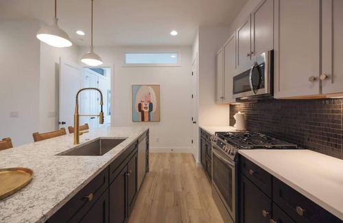 Katie Hill Neighborhood House | Cumberland Social Near Broadway | Rooftop Hot Tub