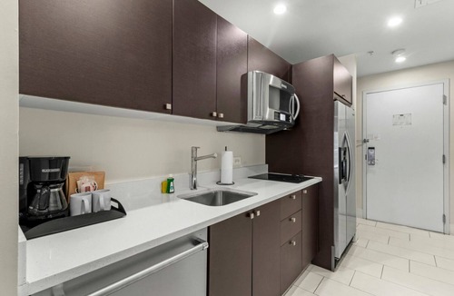 Ludlam Hotel | Embrace the Miami Lifestyle at its Finest! 2 Amazing Rooms w/Balcony + Kitchen