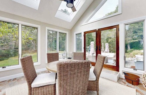 Lagoon Heights House | Enchanting home with tennis, firepit, golf nearby & washer/dryer