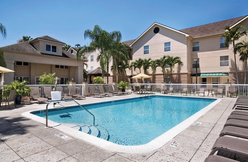 Villas Apartment | Enjoy Free Breakfast and Parking! 4 Classy Units, Steps to Bell Tower Shops!