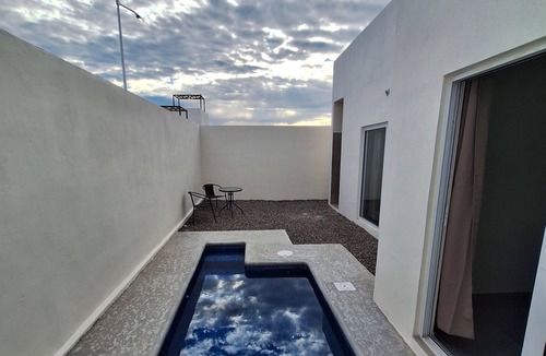 El Centenario House | Enjoyable 2-bedroom house with AC in charming El Centenario. Quiet and safe area