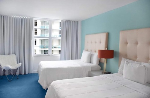 Mid Beach Hotel | Experience Beach Life in Our Tranquil Suite with Balcony
