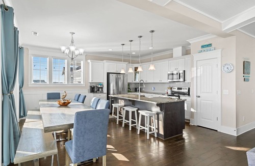 Yaupon Beach House | Experience ocean views at Panama Breeze, a spacious 6-bedroom retreat in Oak Island.