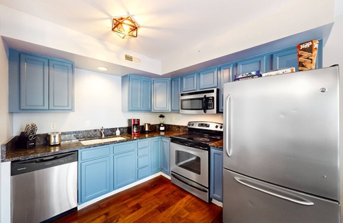 Lewes House | Fairway Village Lewes townhome in great location with deck, games, W/D, and AC
