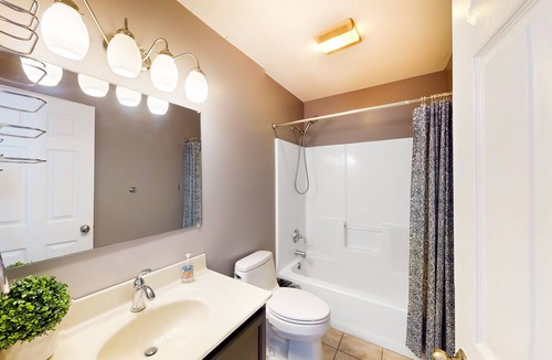 Lewes House | Fairway Village Lewes townhome in great location with deck, games, W/D, and AC