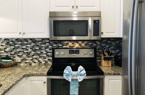 Fort Bay House | Gated Quiet Private Beach - Gulf Pool - Free Beach Chair service March to Oct