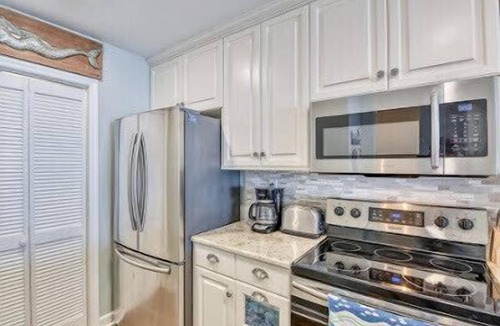 North Topsail Beach Condo | Glamorous 2 Story Beachfront Condo on Topsail Island