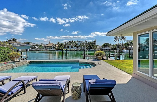 Sarasota House | Gorgeous Canalfront Home w/Heated Pool 5-Min Walk to Lido Beach Boat Dock