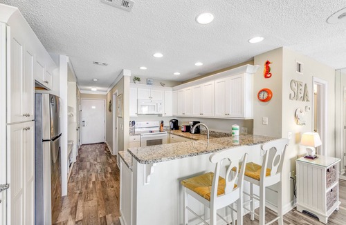 Fort Bay Condo | Gorgeous, waterfront condo w/a shared pool, hot tub, & beach access