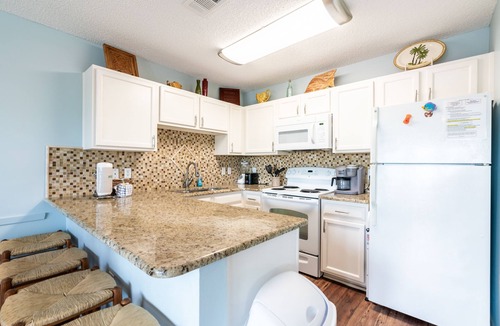 Crystal Beach Condo | Gulf view, direct beach access, heated pool, hot tub
