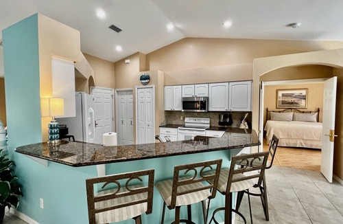 Pelican House | Heated Pool home in the Rose Garden Tarpon Point area!