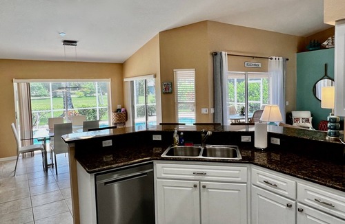 Pelican House | Heated Pool home in the Rose Garden Tarpon Point area!