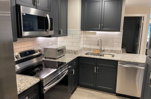 Trinity Vicinity Condo | Historic 2026 Summer Hub: Steps to Train, World Cup & Jazz Fest!