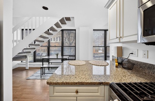 Downtown Syracuse Condo | Historic Armory Square Stay with Private Outdoor Space
