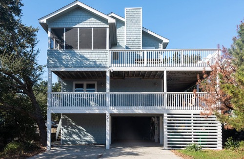 Ocean Sands House | Homey house across from the lake with private pool & hot tub - dog-friendly