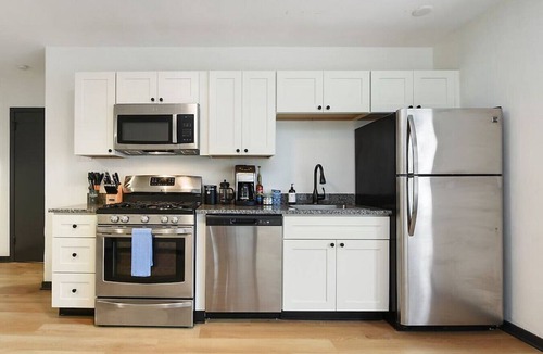 Lower Lawrenceville Apartment | HostWise Stays - Spacious King Bed Apartment on Butler St. in Lawrenceville!