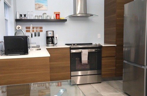 Laurel Condo | Just one minute drive to the beach.