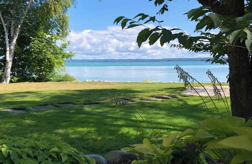 Rapid City Cottage | LAKE HOUSE on Beautiful TORCH LAKE - 175' of lakefront on 1.5 acres to enjoy!