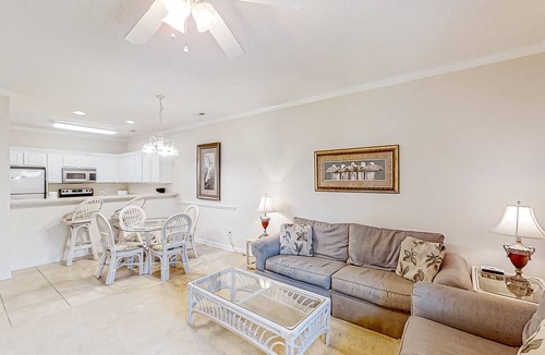 Little River Condo | Lake-view ground-floor condo with screened patio, W/D, & pool