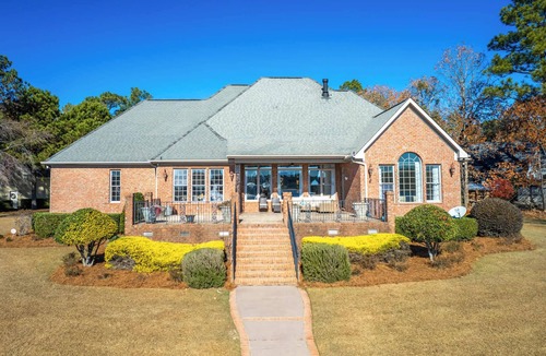 Olivia House | Lakefront Family Retreat with Game Room Fun