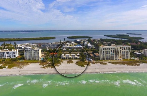 Longboat Key Apartment | LaPlaya 201C Breathtaking Gulf panorama from this corner end unit with a private stairway to the beach