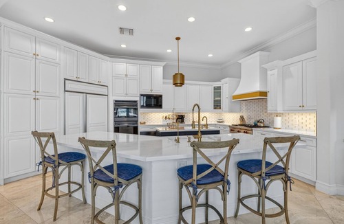 Lighthouse Point Villa | Lighthouse 6 BR Mansion, 90ft waterfront dock, heated pool, hot tub and more!