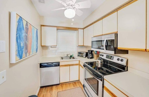 Country Club Estates House | Lovely dog-friendly Scarborough Village home with spiral staircase, patio & W/D