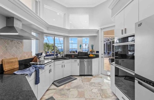 Yacht Club House | Lux Riverfront Retreat~Pool~Spa~Outdoor bar~Tropical Yard~Direct Gulf Access