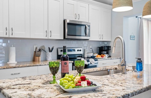 Palm Harbor House | Luxurious Spa Retreat with Stunning Pool in Palm Harbor
