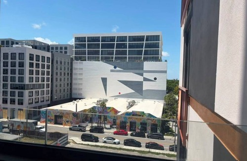 Wynwood Art District Condo | Luxury Designer Retreat in Wynwood/Skyline. 2BR. Pool & Bar