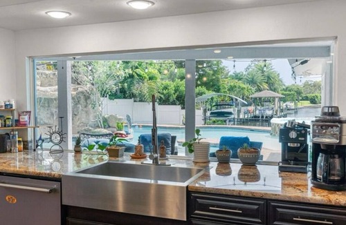McGregor House | Luxury Waterfront Home w Pool HotTub and Waterslide. Off McGregor near Beaches