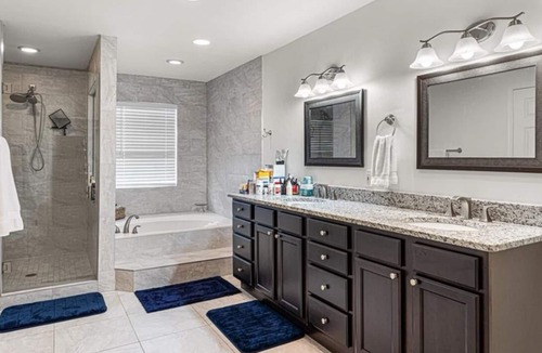 McGregor House | Luxury Waterfront Home w Pool HotTub and Waterslide. Off McGregor near Beaches