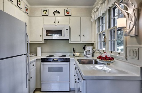 Mirror Lake Ski Chalet | Maison Rouge, Mid-Century-Modern Swiss Chalet on Beautiful Mirror Lake