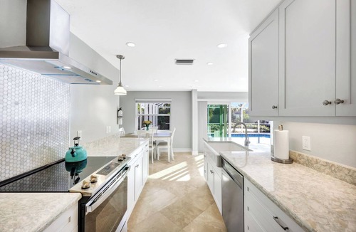 Shell Harbor House | Manatee Cove - Gorgeous Canal Front Home with Heated Pool and Deeded Beach Access!
