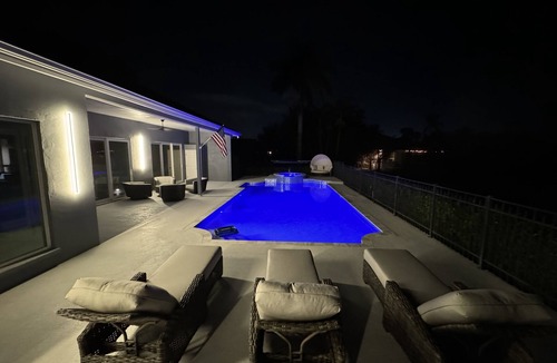 Palm River Estates House | Modern 3BR Naples Home w/Pool, Hot Tub, Game Room & Fast WiFi