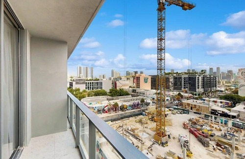 Wynwood Art District Condo | Modern condo with skyline views, rooftop pool & private balcony