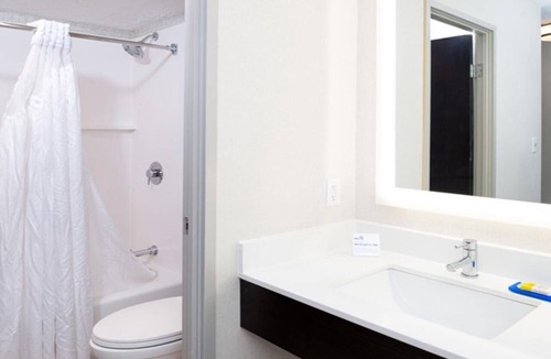 Dent Hotel | Modern Guest Room w/Spacious Layout + Relaxing Bathtub for a Comfortable Stay