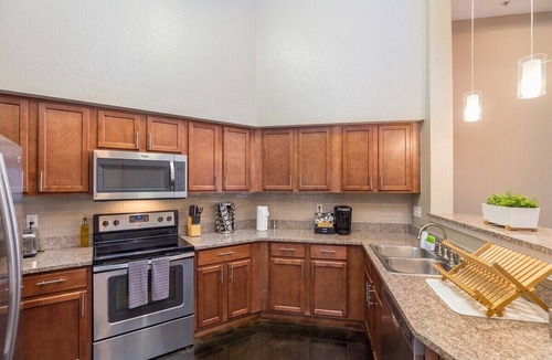 Channel District Apartment | Modern + Smart | King Bed | 55" & 43" TV Sleeps 4