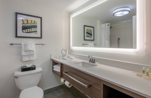 Tropic Hotel | Modern Space Coast Escape | Outdoor Pool | Free Parking | Near Sports & Shopping