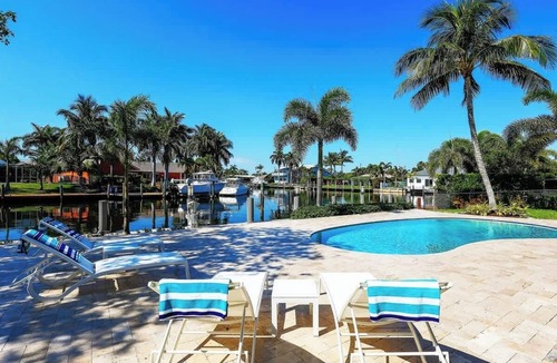 Lighthouse Point Villa | Modern Waterfront Home w/Heated Pool, Avocado Tree