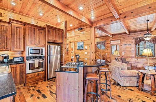Tuckasegee House | Mountain cabin with wrap-around balcony, games, fireplace, & children's items