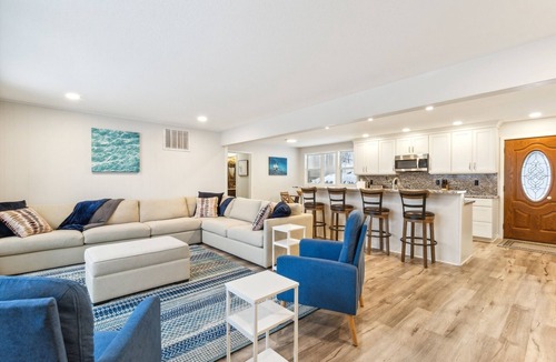 Rapid City House | NEW! Beautiful Torch Lake House with Beach Access