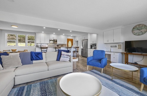 Rapid City House | NEW! Beautiful Torch Lake House with Beach Access