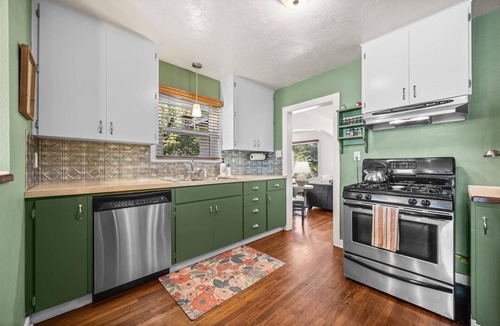 Sunset House | North End Charm: Cozy Fam Friendly Cottage with Fireplace and Dog-Friendly Fenced Yard!